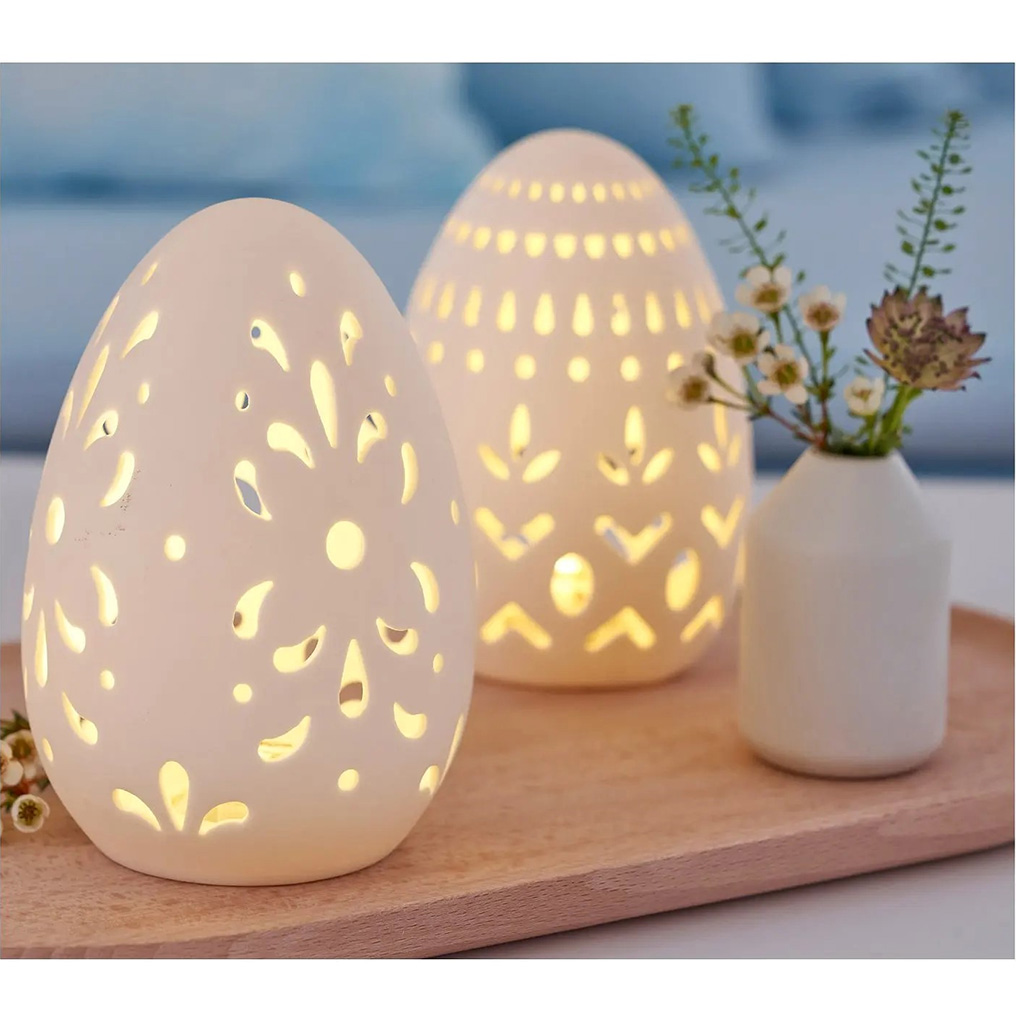 Decorative ceramic egg with LED and carvings 13x9 cm
