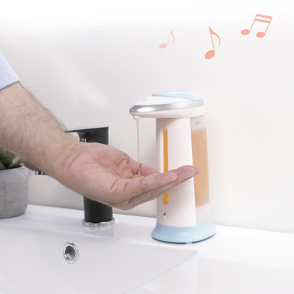 Automatic soap dispenser with light and sound